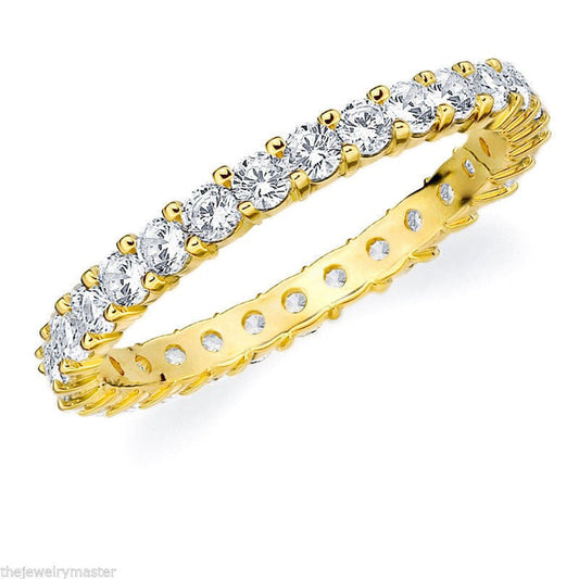 Yellow Gold Eternity Band With Round Stones In 3.00 Carat Total Weight.