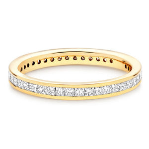 Yellow Gold Eternity Band With Princess Channel Set Stones In 1 Carat Total Weight.