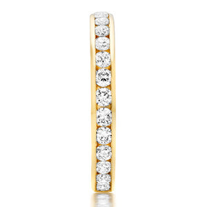 Yellow Gold Eternity Band With Round Channel Set Stones In 1 Carat Total Weight.